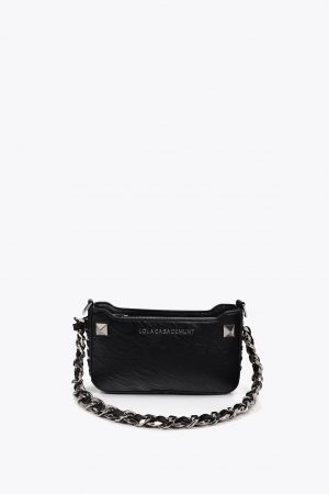 BOLSITO CON DETALLES METÁLICOS Y TACHAS