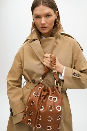 BOLSO JUDAS CON OJALES METALIZADOS